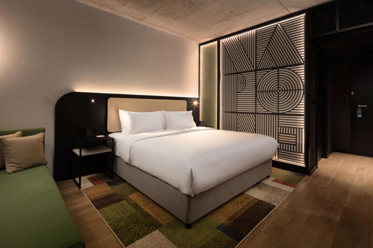 Kamer met Kingsize Bed en Slaapbank